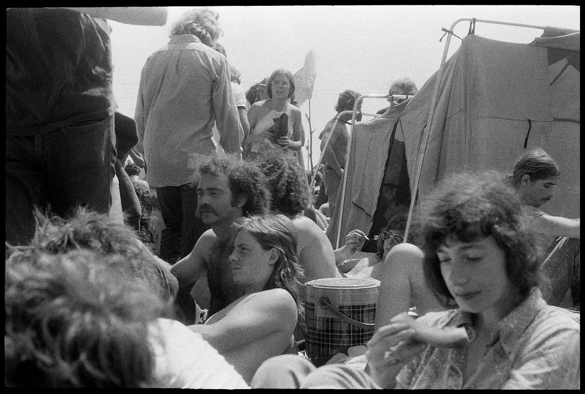 A03_051a.jpg -  The next morning, there was a long walk to the concert area, a 90 acre spot that had been fenced off and was already filling up with people.  We started hearing rumors that there were WAY more than the 150,000 estimate of the night before. The previous year, I had been to the Pocono Jam where 200,000 showed up and this looked a lot bigger.