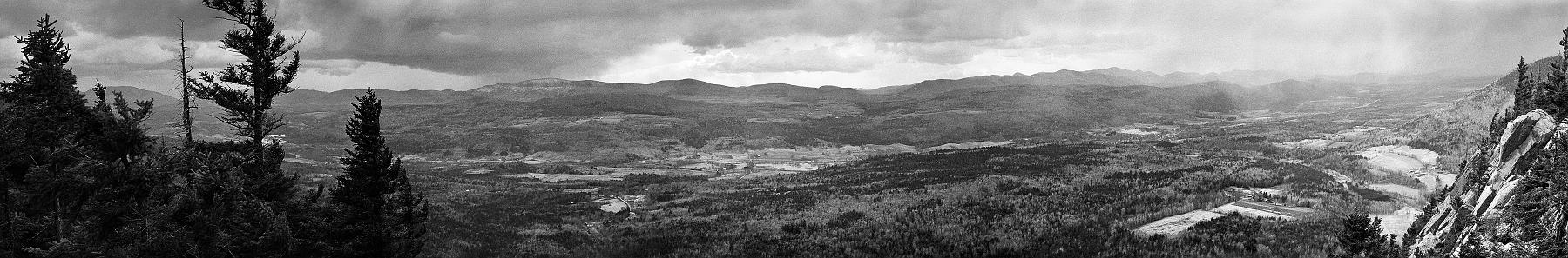 15_Pano_a_sm.jpg - Here's a panorama from the summit.  The nice spring day was starting to look a little spooky... there were some really dark clouds to the southwest...