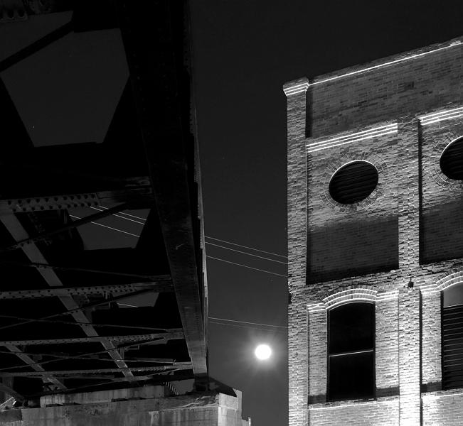 DSC_3703b.jpg - Railroad bridge. RAW file, 30 second time exposure at f8.  Nikkor 18-135 @ 18mm. Bogen 3020 tripod, Arca Swiss head.  Convered to B&W and perspective corrected in Photoshop.