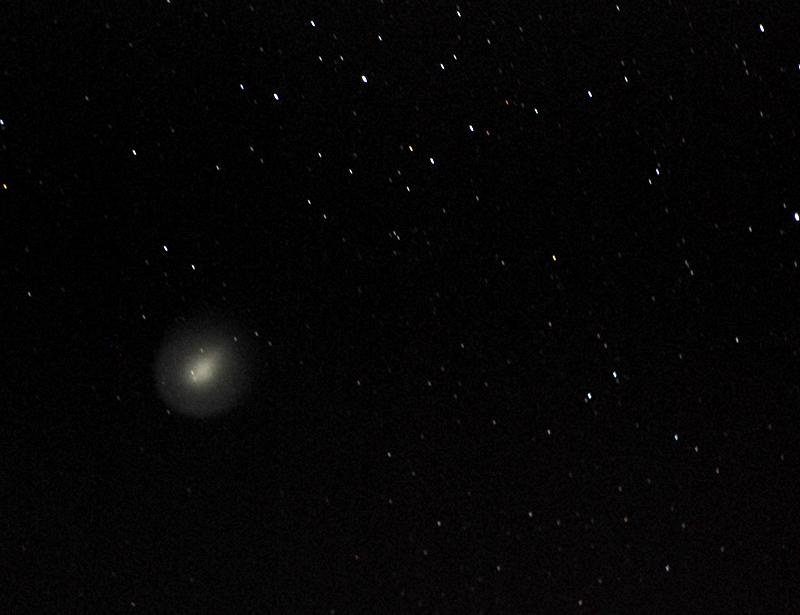 DSC_3994_sm.jpg - Comet Holmes, November 11, 2007.  Nikon D80 with Sigma 70-300APO at 300mm.  Bogen tripod, Arca Swiss head.  Six seconds @f5.6, ISO 3200.  Six exposures combined in Photoshop to reduce noise.