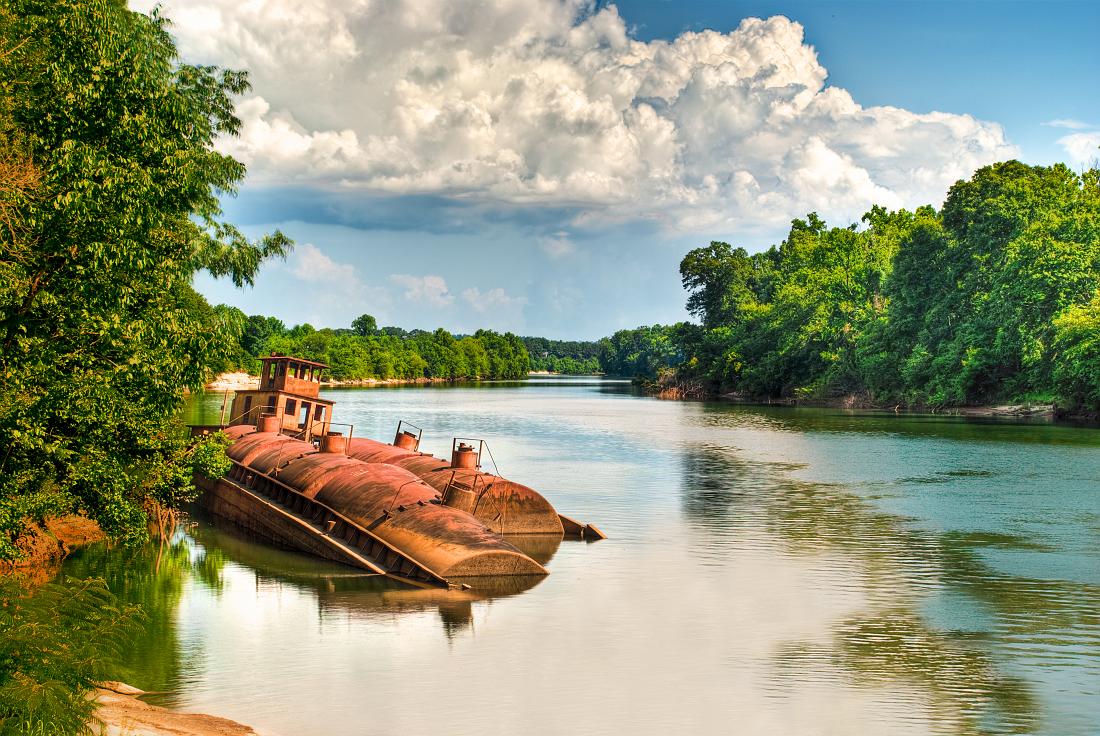 BH10_3024_HDR2_tonemapped.jpg - This rusted tug and barge on the Chattahoochee (near Rotary Park) was used to transfer molasses. When the company went out of business in the 1960's it was just left here. The name of the tugboat is the Scintilla.